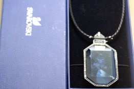 Swarovski pendant in original box together with si