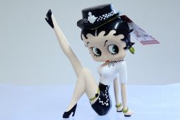 Betty Boop figure sitting policewoman