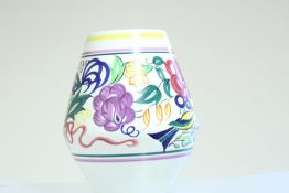 A Poole Pottery earthenware vase, of tapering ovoid form, hand-painted with polychrome flowers and