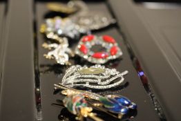 Collection of silver brooches