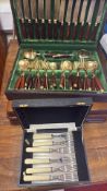 Group of cased cutlery including gilt-coloured flatware and set of six handled forks