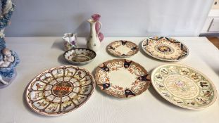 Group of decorative ceramics including commemorative calendar plates and small jugs