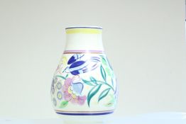A Poole Pottery baluster vase, of ovoid form with waisted neck, decorated in polychrome with