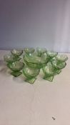 Green pressed-glass dessert bowl set with matching serving bowl