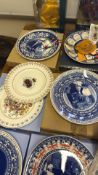 Group of Wedgwood commemorative ware, porcelain clown dolls and pig figures with ephemera