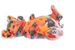 Anita Harris lying down pig signed in gold