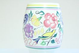 A Poole Pottery England baluster vase, decorated with polychrome floral sprays and a bird, with