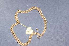 9ct Gold converted albert chain, each link marked 375 with heart padlock Total weight 40.03g