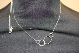 2 Boxed silver necklaces