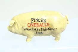 Cast iron pig money box finck's overalls