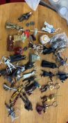A group of Star Wars character keyrings and small figures