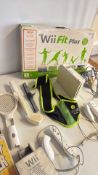 Nintendo Wii console with boxed Wii Fit Plus, games and accessories