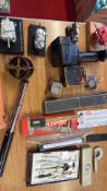 Group of technical instruments, drawing tools, and miscellaneous workshop items