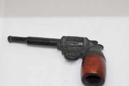 Novelty smokers pipe in the form of a gun