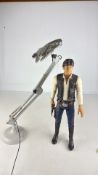 2 Star Wars Themed Items: Han Solo Action Figure and Millennium Falcon Lamp