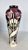 A Moorcroft Trial tube-lined pottery vase, dated 23.8.16 (height 36cm)