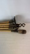 Group of vintage long-handled garden and farm tools