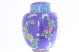 A Chinese cloisonné enamelled ginger jar and cover, decorated with blossoming lotus and