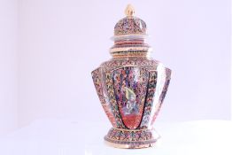 A Thai-style lidded baluster jar, of lobed form, richly enamelled in polychrome and gilt with