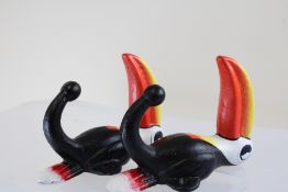 Pair of cast iron toucan coat hooks