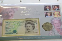 The royal family coin, note & stamp album - 25 pag