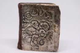 Silver covered miniature bible