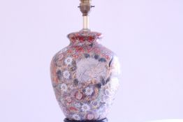 A Japanese Imari-style porcelain table lamp, of baluster form with flared neck, densely decorated