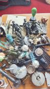 Group of sciâ€‘fi action figures and assorted accessories/diorama parts