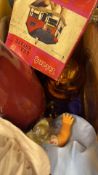 Group of assorted household items including ceramic vase, carved tray, boxed “Trian” game, doll