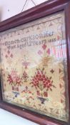 A framed 1845 dated needlework sampler, Elizabeth Clarkson Ker (52.5cm x 51.5cm including frame)