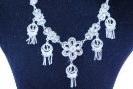 White metal ornate necklace