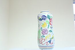A Poole pottery porcelain lamp base of baluster form, decorated with polychrome stylised flowers,