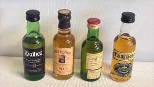Group of miniature single malt Scotch whisky bottles