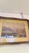 Framed signed landscape print in carved giltwood frame (52cm x 73cm including frame)