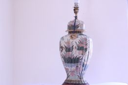 A Japanese porcelain ginger-jar table lamp, decorated with cranes amidst irises and reeds, with gilt