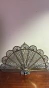 Brass “peacock” firescreen