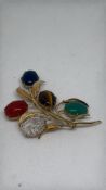WL1-20th-12K Gold Multi Coloured Gem set brooch.