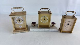 A group of brass carriage and mantel clocks, including Rapport London, Blenfield and Hermle quartz