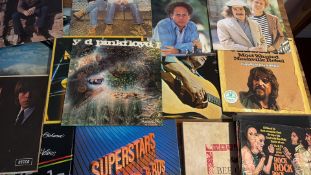 A group of assorted popular and rock vinyl LP records
