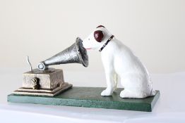 Cast iron Nippy dog on green base rogers foundry B