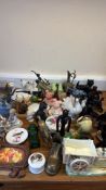 A group of assorted ceramic and decorative animal figurines and small ornaments