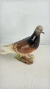BeswickGlazed ceramic pigeon figure