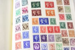 Large early album of British & world stamps