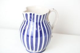 A rare Rye pottery blue and white jug by the potte