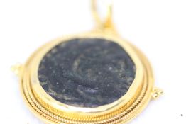 Early Greek coin set in 18ct gold mount Total weight 9.1