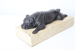 An early c20th bronze on a marble plinth of a recl