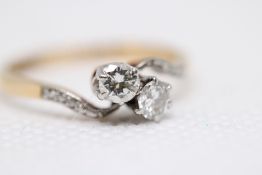 18ct Gold ring set with 2 diamonds each diamond ap