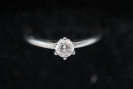 Platinum solitaire diamond ring set with a GIA cer