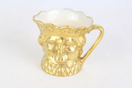 Royal Doulton small gold old king cole toby jug