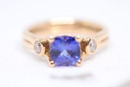 Tanzanite & diamond ring, large central tanzanite